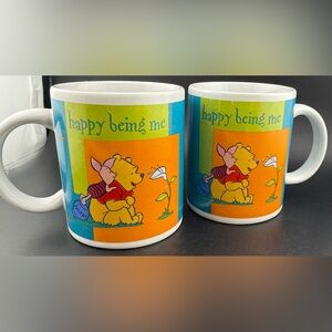 2 Disney Winnie the Pooh “Happy Being Me” ceramic mugs. 12oz